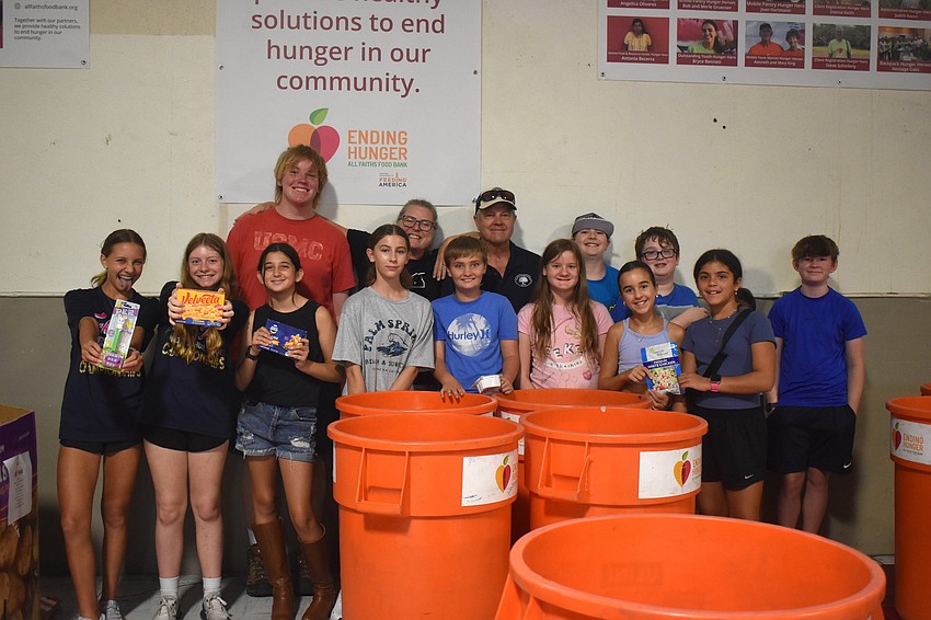Twelve campers and three staff members participated in the All Faiths Food Bank service project on July 17. They determined the expiration dates, looked at the chart to see if things were still safe to eat and sorted them from there.