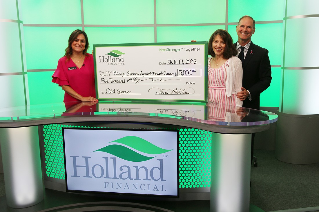 Shady Bauer, senior development manager for American and Cancer Society, Toni Holland and Holland Financial CEO David Holland. Photo by Jarleene Almenas