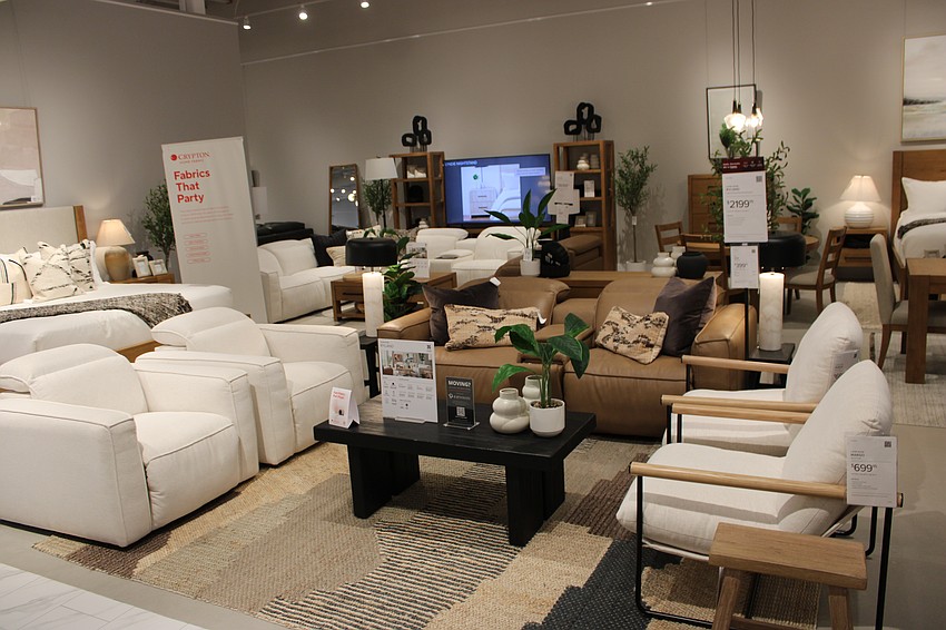 More than 130 people lined up the morning of July 17 to receive $100 rewards cards toward City Furniture merchandise.