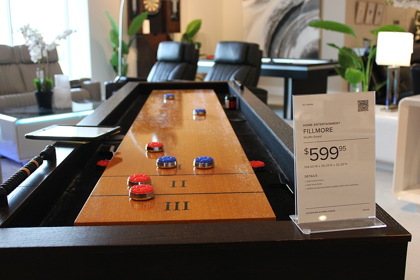 Shuffleboard anyone? City Furniture has displays of popular games that would spice up any man cave.