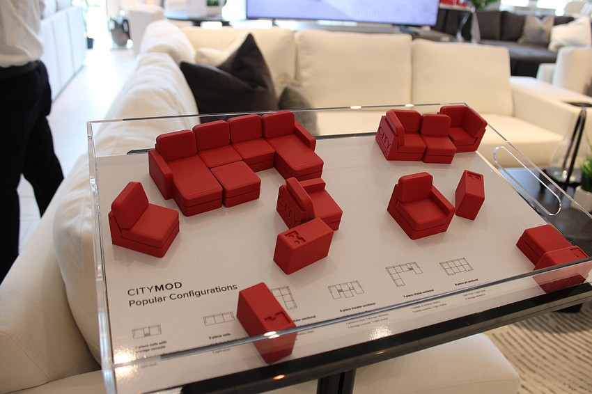 City Furniture has little toy-like furniture that you can push around to see how you want to design your living spaces.