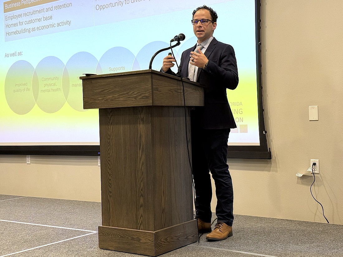 Florida Housing Coalition's Kody Glazer tells an audience at a Greater Sarasota Area Chamber of Commerce luncheon that the county needs to provide 15,000 new affordable housing units in the next 10 years.