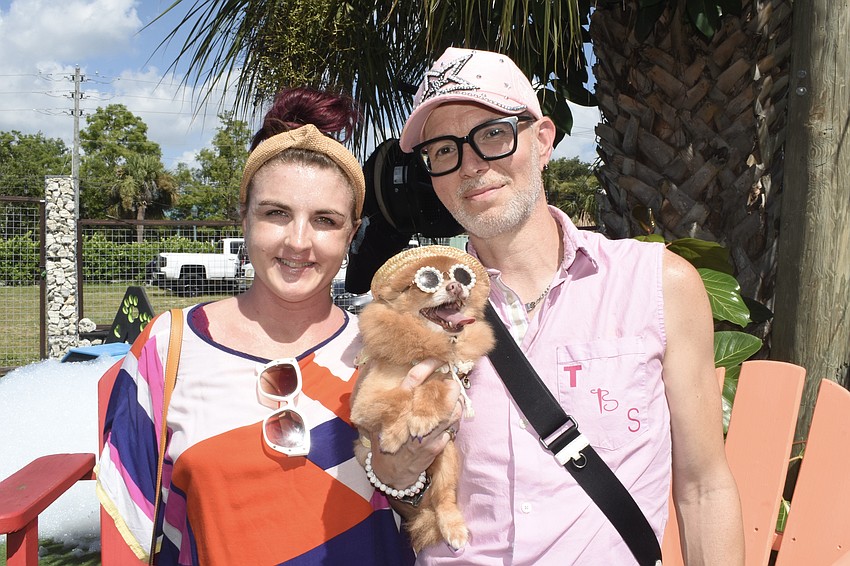 Taylor Sallee, Lolly the Pom, and her boyfriend Mikel Petree came for the grand opening. They are ashion designers with the Clearwater brand Tailor Sallee, and design clothes for pets.