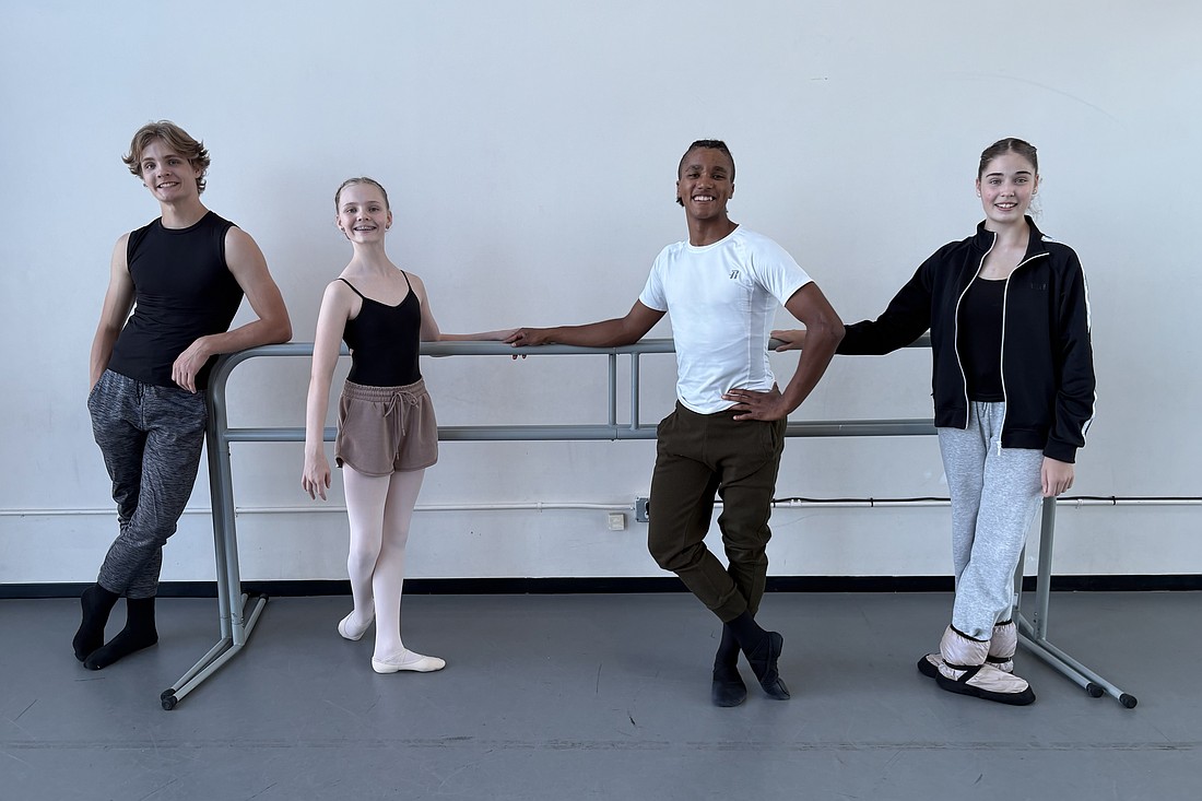 Johnston Kraft, Rosemarie Kraft, Broc Stull and Liesl Kraft relax between rehearsals for InMotion, the recital of the Sarasota Ballet Summer Intensive.