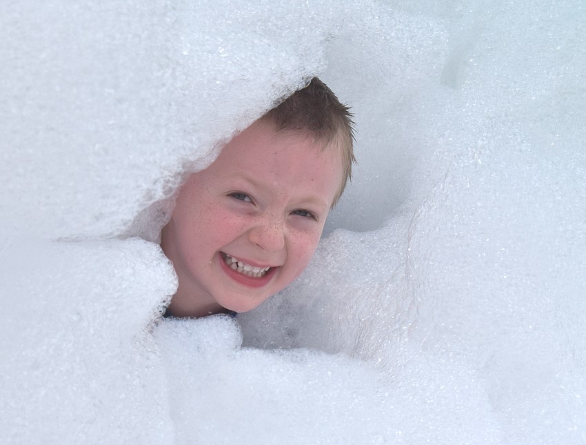 Parrish's Carter Bennett, 4, has a blast during the foam party at the Creative Child Learning Center in Lakewood Ranch.