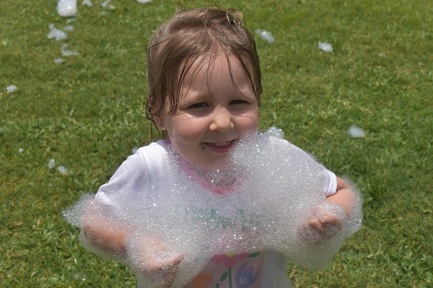 Parrish 3-year-old Zinnia Field said she didn't know what foam was until the Creative Child Learning Center's foam party.
