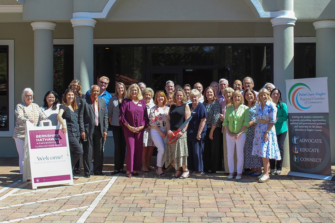Berkshire Hathaway HomeServices Florida Network Realty celebrated the grand opening of its Palm Coast Beach office with a ribbon-cutting ceremony. Courtesy photo