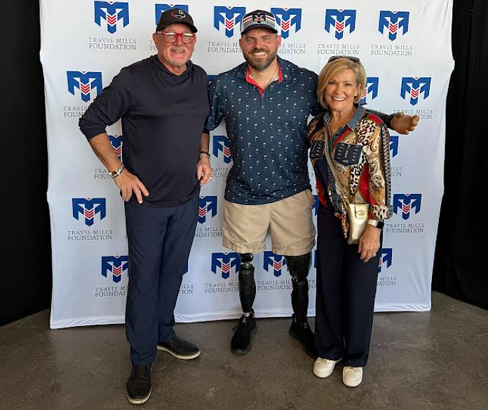Frank Petruno (left) and his wife Marilee Petruno with Travis Mills, founder of the Travis Mills Foundation. Courtesy of Frank Petruno