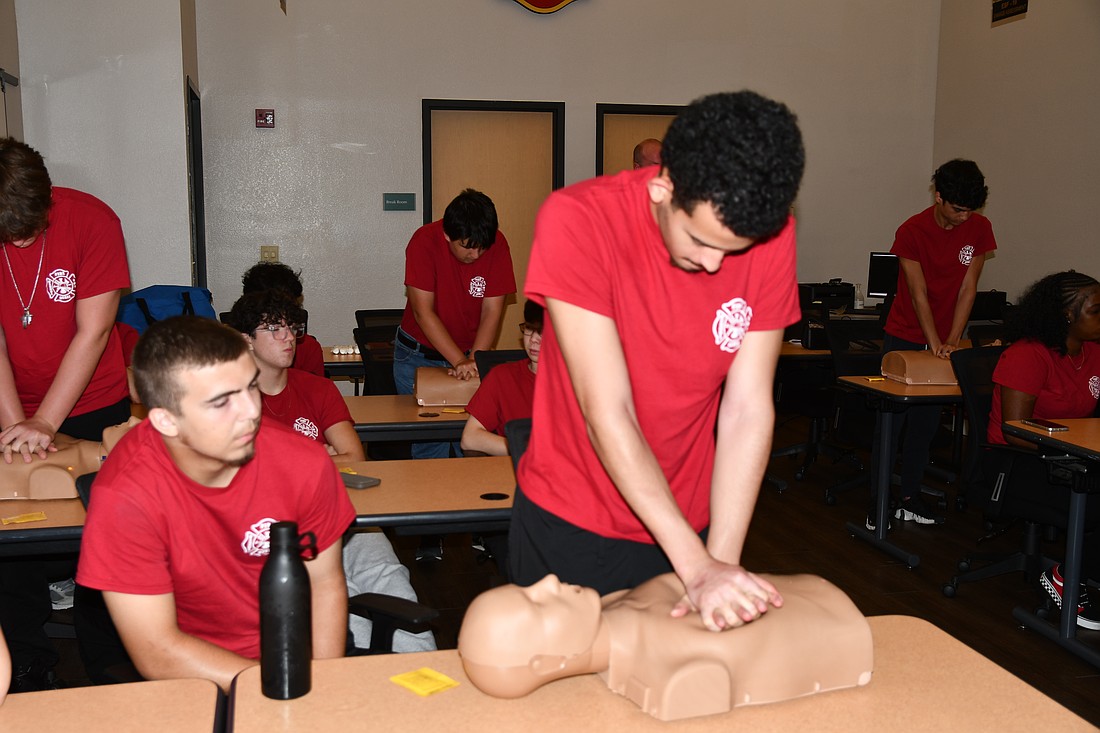 Yeniel Gltay, from West Orange High, practiced his CPR skills.