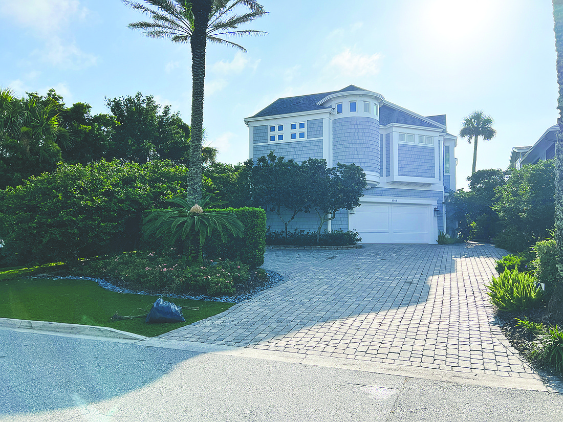 Oceanfront two-story home built in 1942, features four bedrooms, six full and one half-bathroom, porches, balcony, pool and dune walkover.
