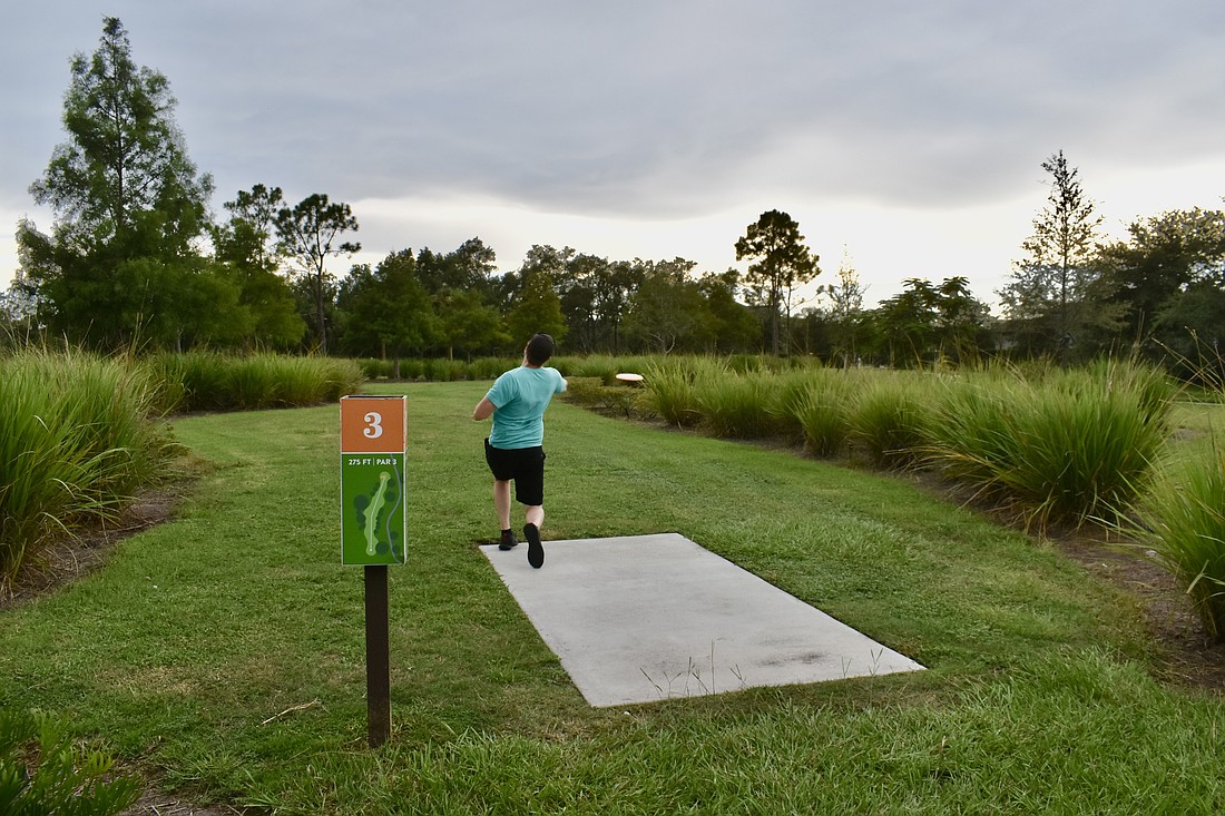 Curtis Marxen drives a disc down Hole 3 at Bob Gardner Community Park July 21.