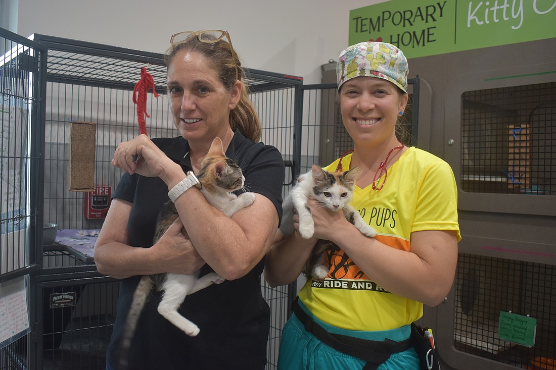 Dari Oglesby, the executive director of Nate's Honor Animal Rescue, and Sharon Pindar, the medical director, are thrilled with a $125,000 grant from The Bishop-Parker Foundation.