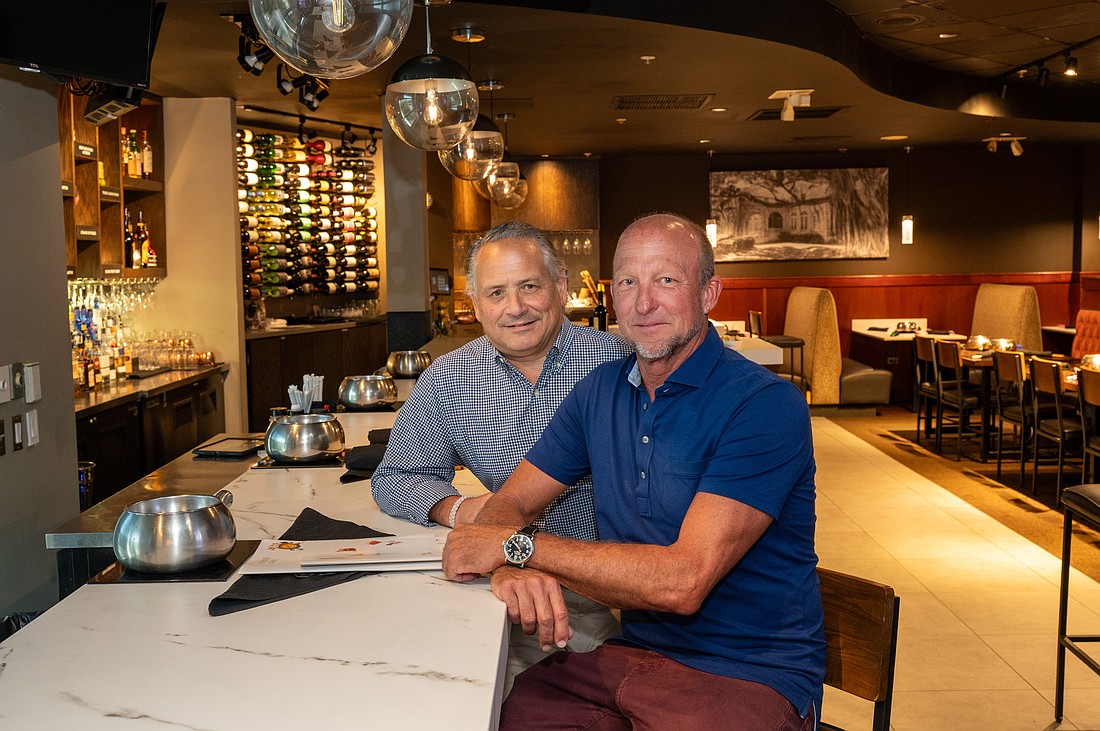 Barry Berkowitz and Eric Seace bring decades of Melting Pot experience to the table as owners of the restaurant in Sarasota.
