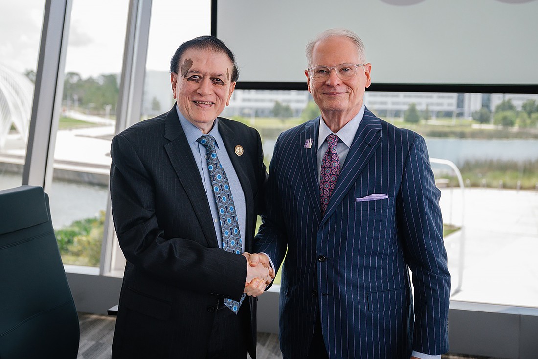 Dr. Kiran C. Patel, founder of Orlando College of Osteopathic Medicine, and Dr. Devin Stephenson, president of Florida Polytechnic University, signed an agreement on Tuesday, July 22, to create a six-year BS/DO program, offering a fast-track route to a medical degree.