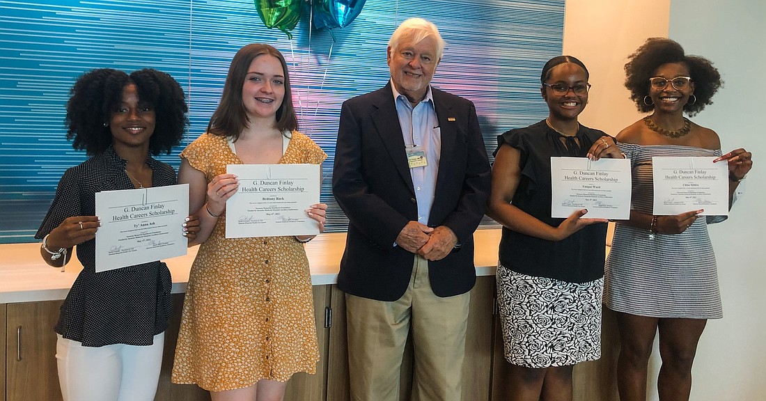Dr. Duncan Finlay with students from the G. Duncan Finlay Health Careers Scholarship program.