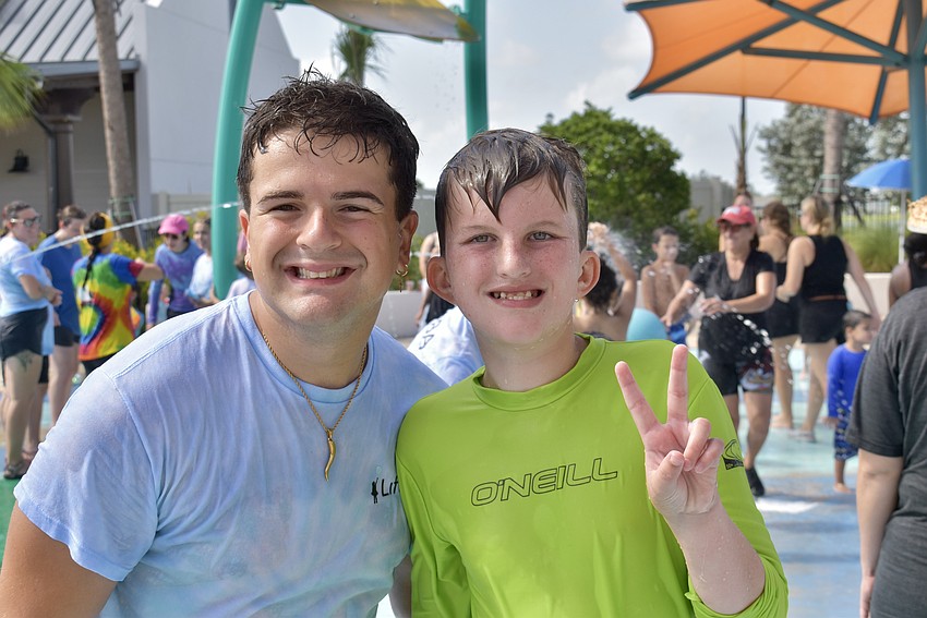 John Day is the camp's program assistant, and 13-year-old Gavin McHugh is a camper.