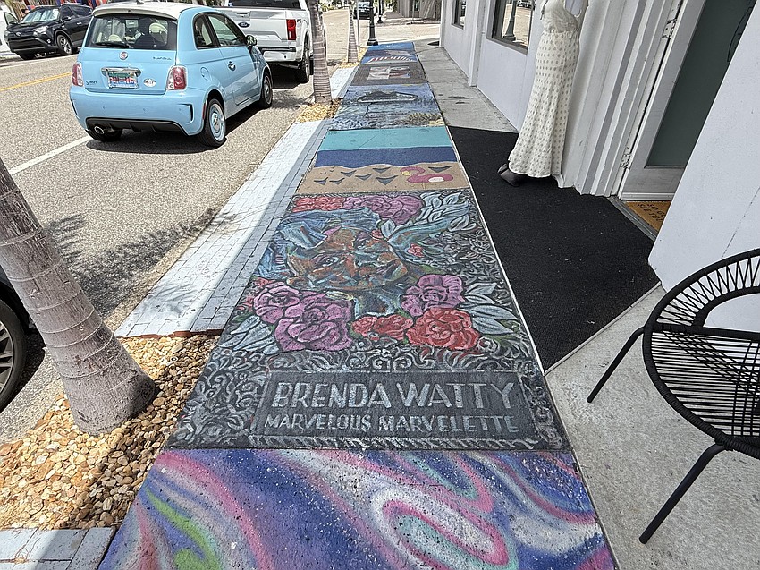 Sidewalk paintings such as these along Pineapple Avenue in Burns Court are noncompliant with FDOT standards. The city risks state funding if not removed, according to city staff.