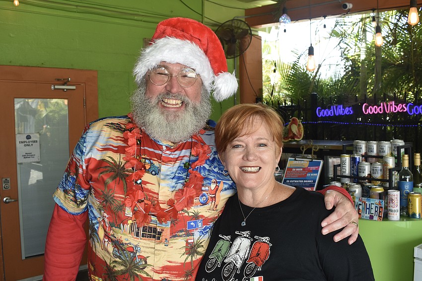 Surfer Santa and Debi Kleer