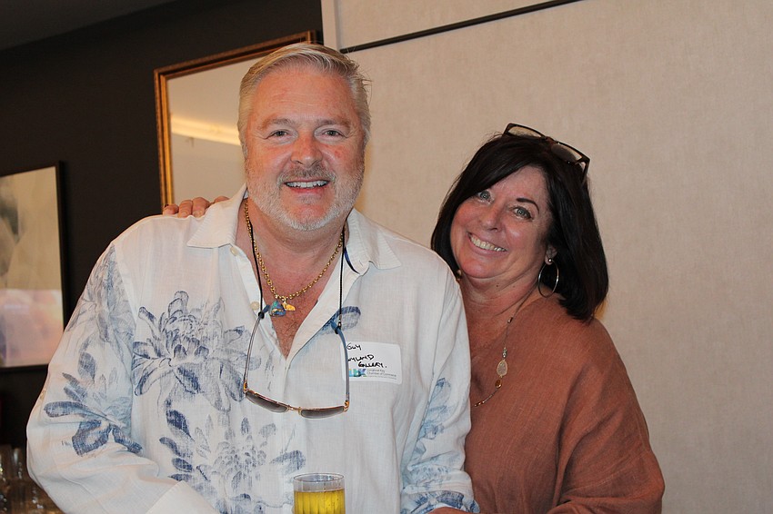 Guy Vincent and his wife, Kimberly, join members of the Longboat Key business community at a July 23 Off the Clock networking event.