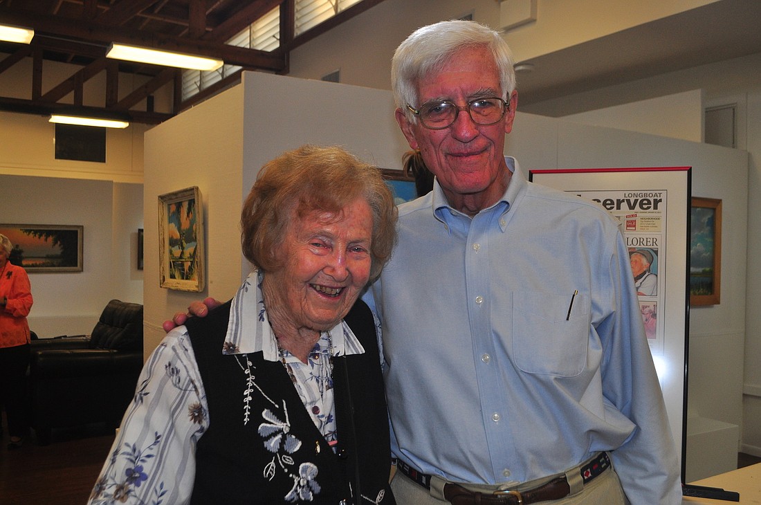 Jeremy Whatmough poses with Virginia Sanders in this 2013 photo. Whatmough, a former town commissioner and mayor, died on July 21.