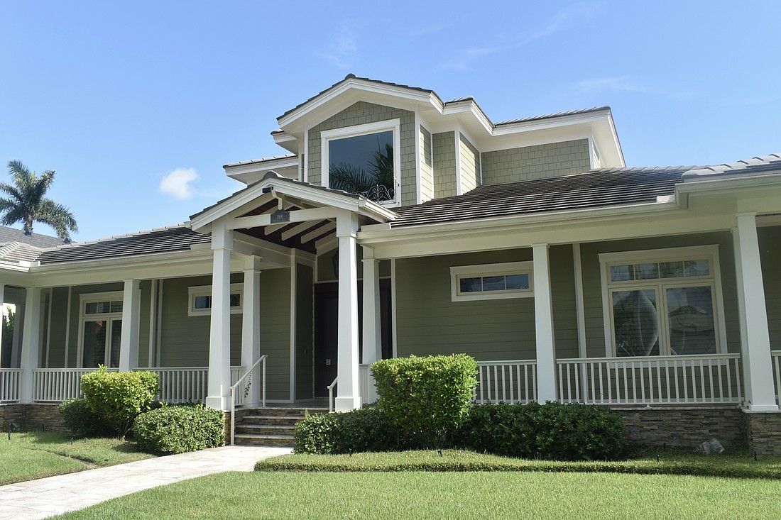 The two properties at 1910 Datura St. were built in 2013. The first has three bedrooms, three-and-two-half baths, a pool and 5,234 square feet of living area. The second has one bedroom, one bath and 426 square feet of living area.