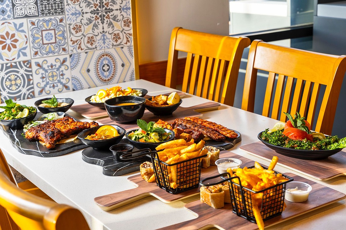 The Dough Show offers Middle Eastern cuisine including savory and sweet feteer; bowls and platters; wraps; appetizers; salads, desserts; and refreshers.