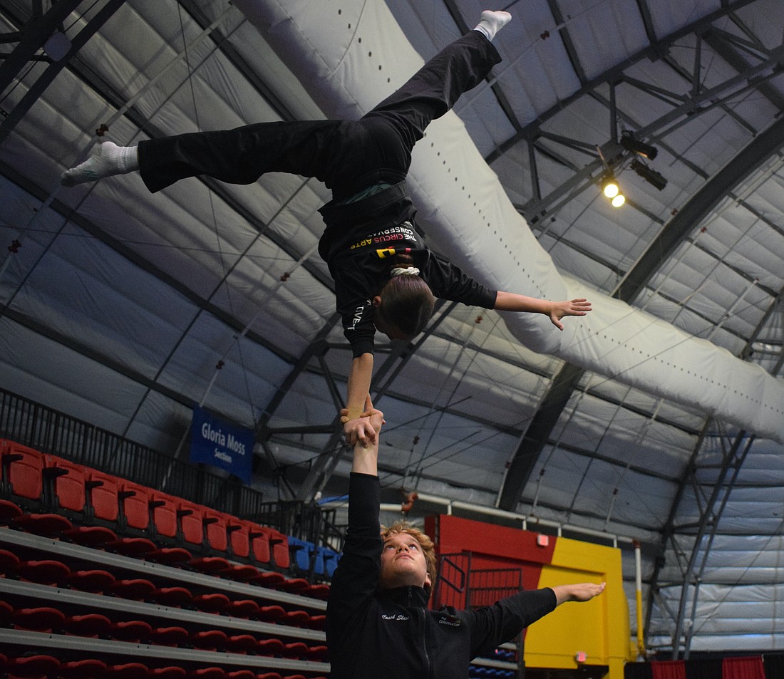 Erik Deubler used to shake until he cried from lifting his partners in gymnastics, but has stuck with the sport to become a national champion alongside partner Arina Kosakovskyy.