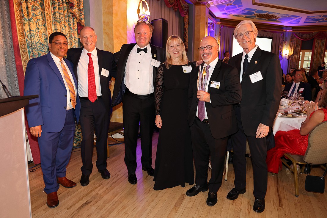 The Jacksonville chapter of the American Board of Trial Advocates received the Chapter of the Year Award July 12 at the national organization’s summer meeting. From left, Ray Reid, Josh Whitman, 2025 chapter President Jamie Holland, Corinne Hodak, Scott Costantino and Wayne Hogan, a founding member of the chapter.