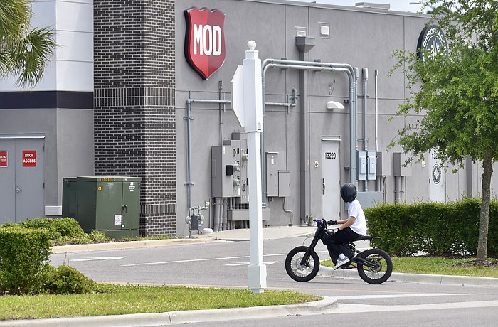 The electric dirt bike seen here is a Talaria XXX Pro that retails for about $3,000. The manufacturer states that it was designed for off-road use by riders 16 years of age or older.