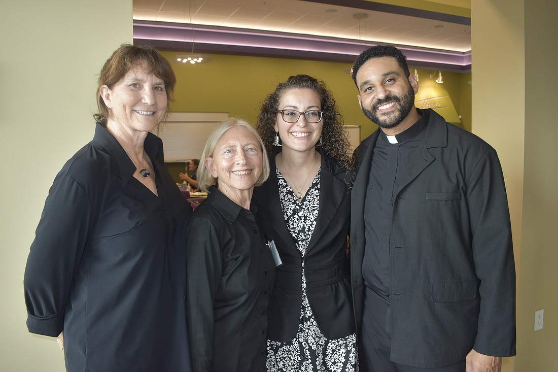 Betsy Friedman, interim executive director, and Andy Blanch, founder and director, of Sarasota Strong, and Sister Kristina Abernathy and her husband Father Paul Abernathy