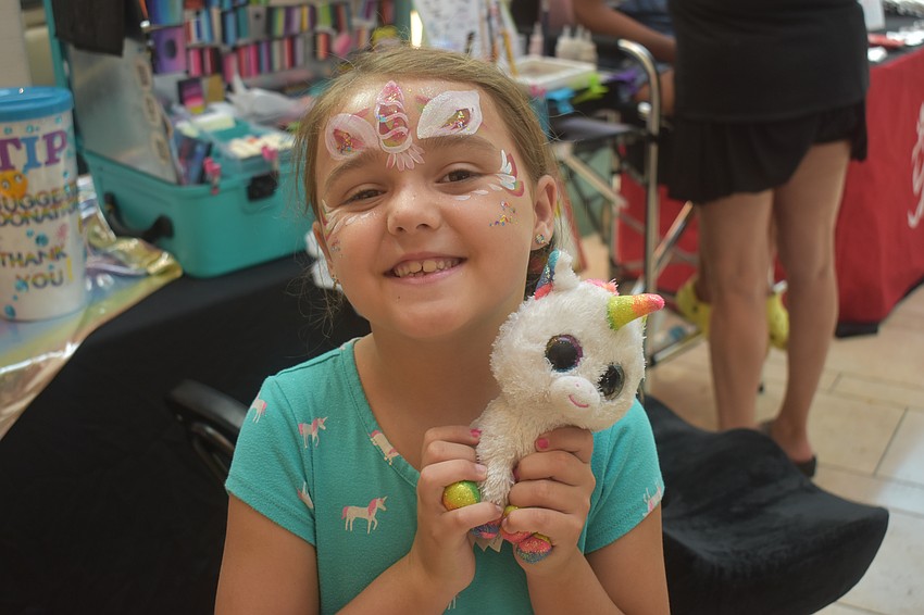 Venice resident Novella Whitt's favorite animal is a unicorn, so getting her face painted like one was a no brainer.