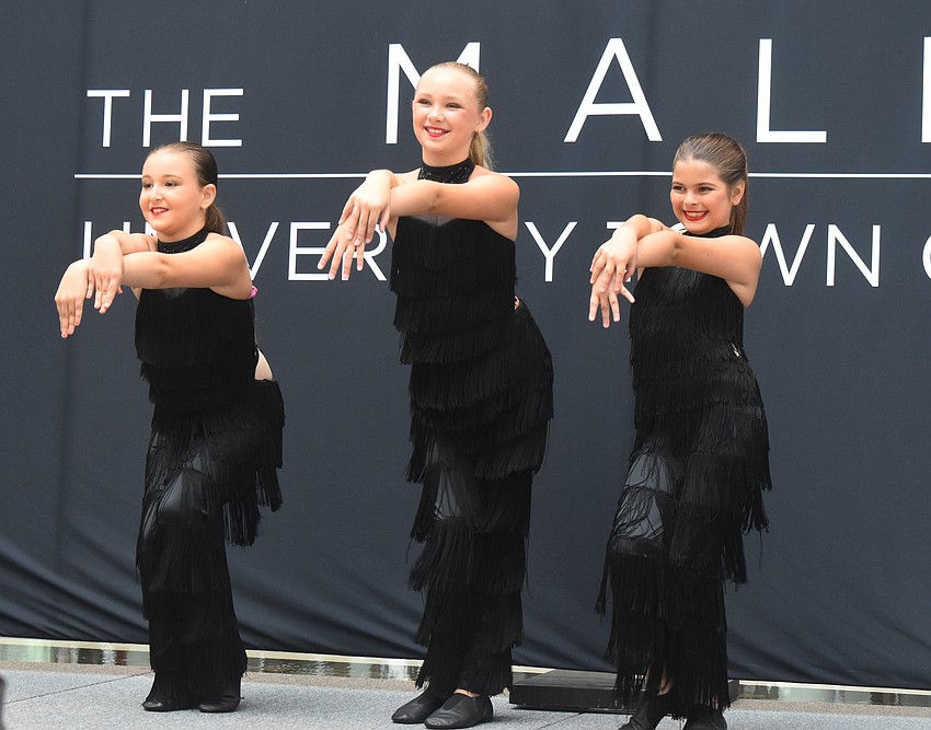 Dynasty Dance Clubs dancers Laura Stewart, Isabella Chiaponne and Elena Madrigal perform a jazz number to a song titled 