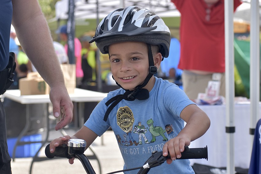 Jeremiah Vidal, 5, gets a helmet.