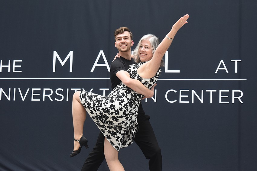 Dance instructor Anton Shurhot and dancer Elizabeth Morgan perform to the song 