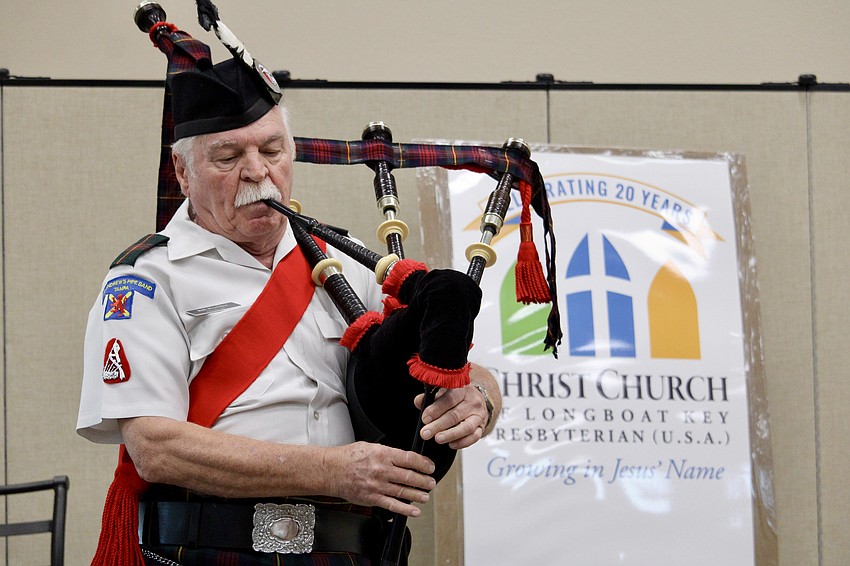 Bill Buckley lends his musical talents on the bagpipe at Christ Church of Longboat Key's fundraiser for rebuilding from severe flooding in Texas.