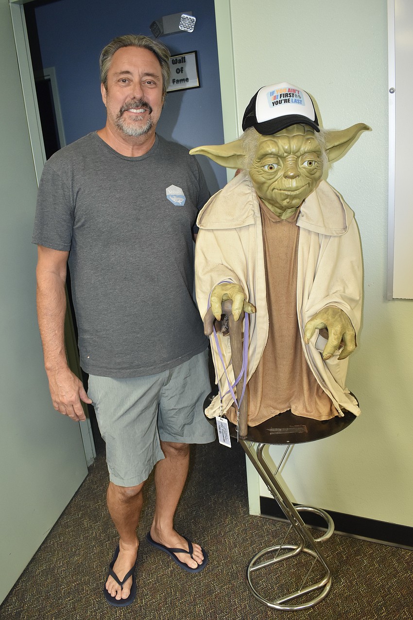 Fourth grade teacher John Thomas Freeman IV received this statue of Yoda from his father, John Thomas Freeman III.