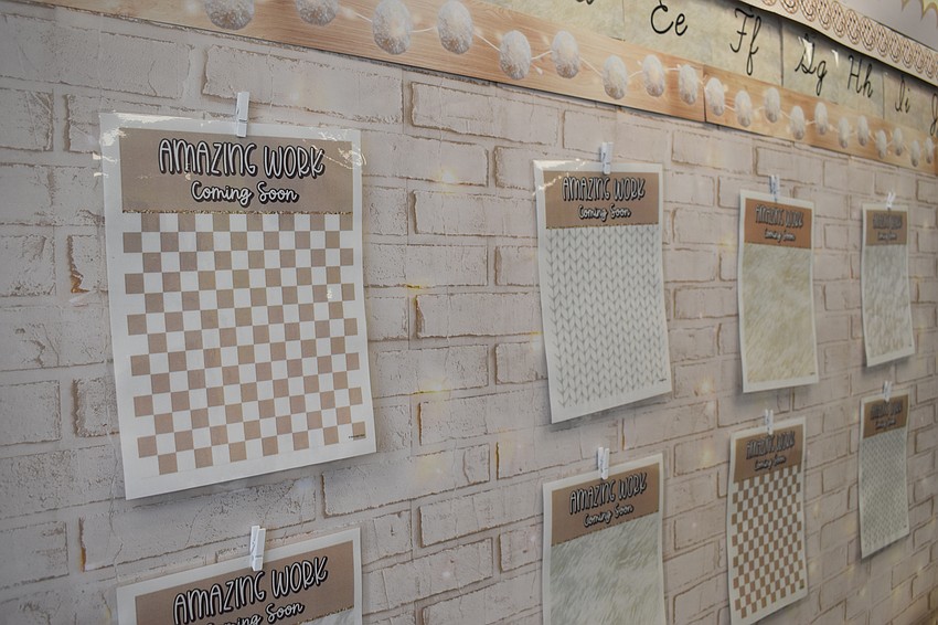 Fifth grade English language arts teacher Ashlee Middleton is preparing to host a display showcasing her students' great work.