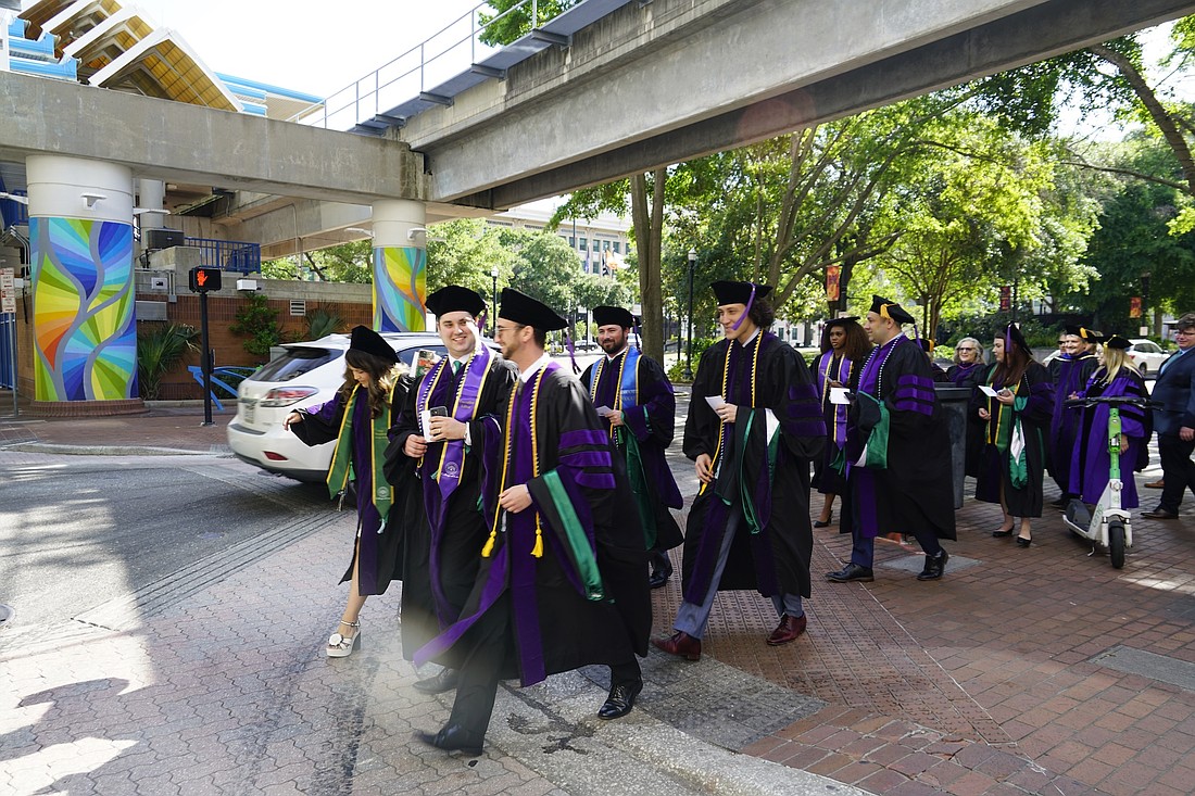 On May 2, the inaugural class of Jacksonville University College of Law graduates marched from their campus at 121 W. Forsyth St. to the Duval County Courthouse for their commencement ceremony. JU’s first juris doctors were in Tampa July 29-30 taking the Florida Bar exam.