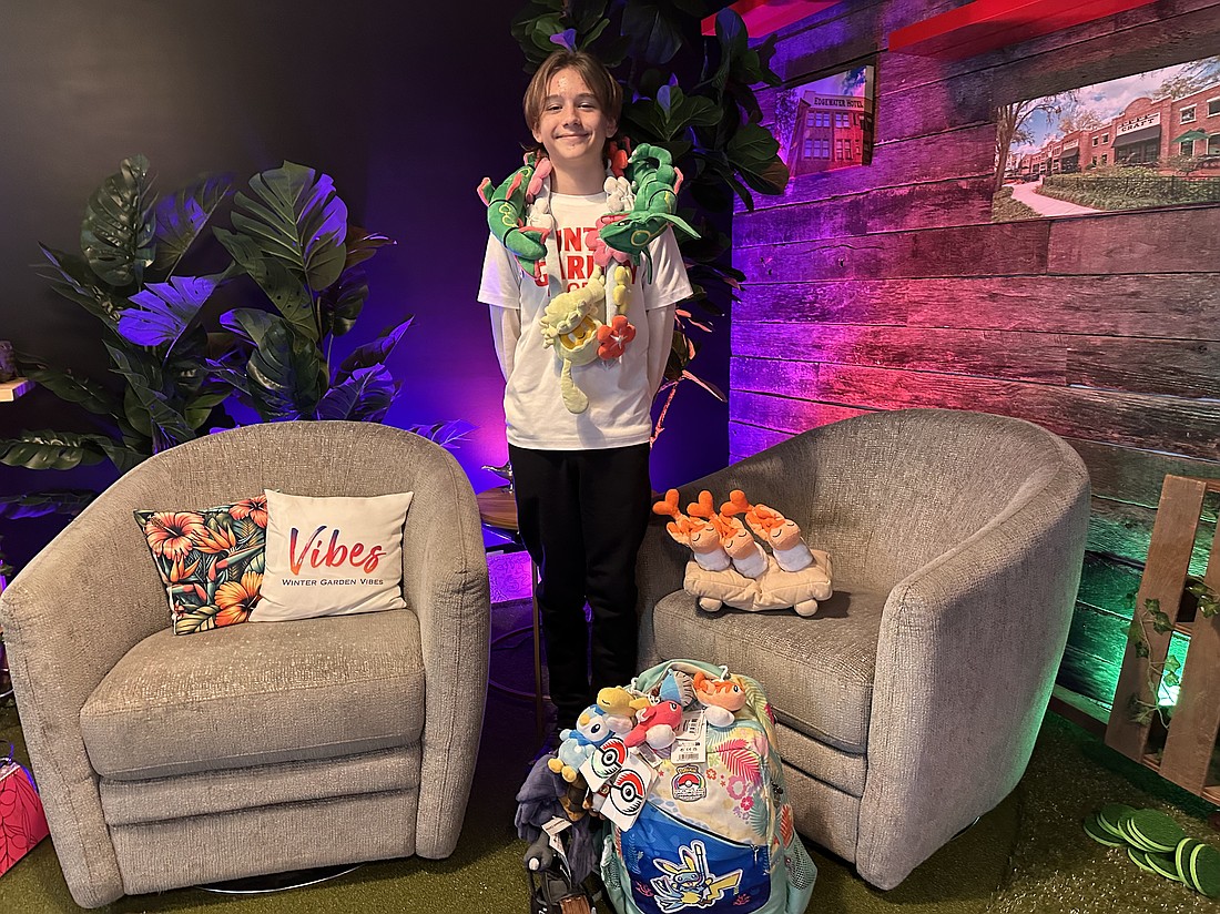 Eleven-year-old Lleyton Chan takes his Pokémon plushie collection to all competitions.