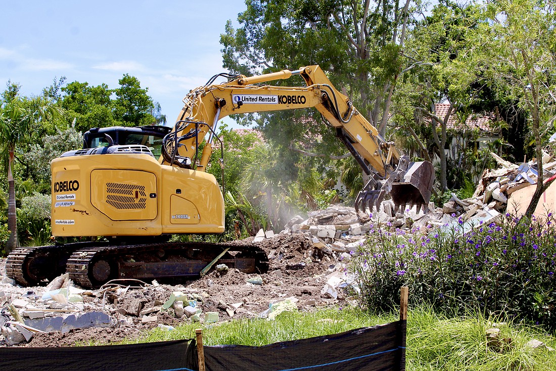 Demolition began last week on the home at 634 Buttonwood Drive, which was badly damaged by hurricane-related flooding.
