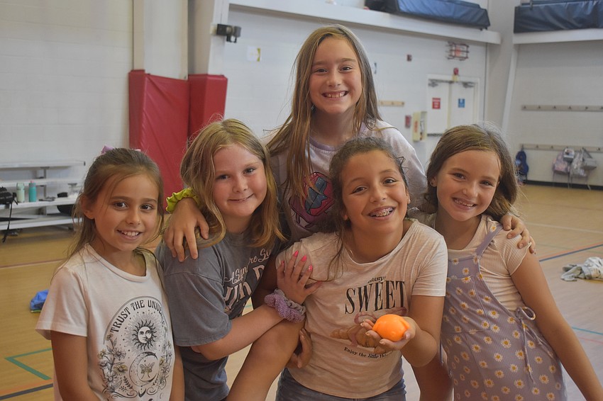Isabelle McCann, Ellie Mclellen, Fiona Reinhold, Alia Lascaibar and Nadiyah Aljukic attend the camp for 8 and 9-year-olds. They do a little bit of everything including sports, crafts and games.