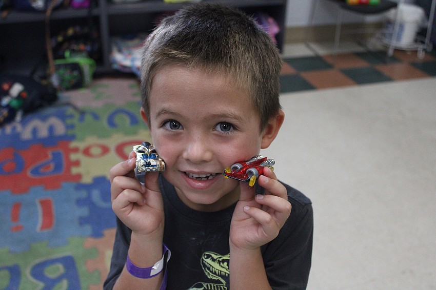 Lakewood Ranch's Beckett Sage, 5, says his favorite part of camp is the toys. Cars are his favorite and he hopes to become a race car driver.