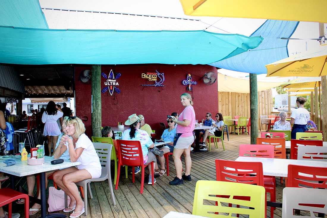 Amy Blair, the manager at the Old Salty Dog on City Island, said visitors often enjoy seeing dolphins, sharks, seabirds and other wildlife from the waterfront seating.