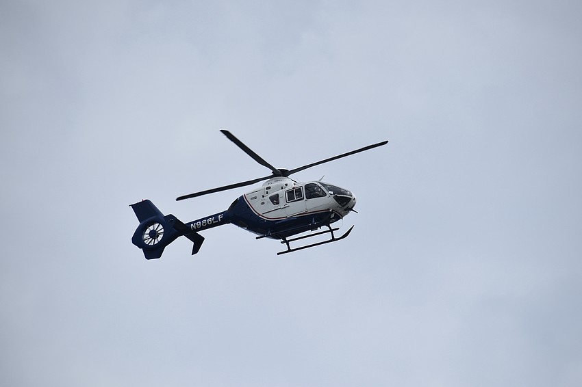 The helicopter approaches.