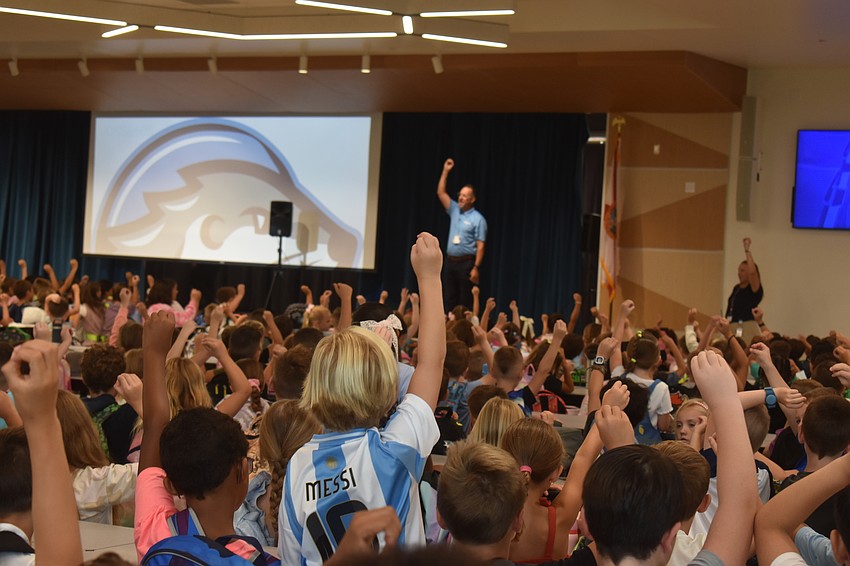 Todd Richardson directs the students to make an 