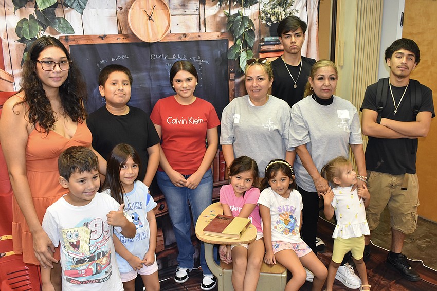 Families had the chance to gather for a Back-to-School portrait. Front row: Liam Deanda, 5, Sophia Cruz, 8, Kalani Herrera, 5, Layla Cruz, 5 and Sissy Herrera, 3. Back rows: Carmen Deanda, Mario Colin, 11, Esmeralda Guzman, 15, Patty Guzman, Chris Guzman, 15, Sol Guzman and Kevin Colin, 17.