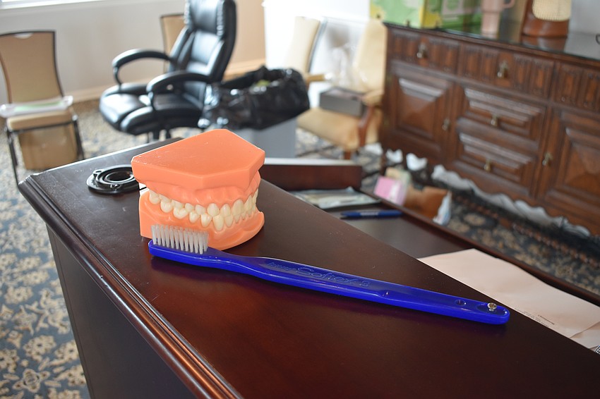 Dentist Dave Schroeter offered free dental checkups.