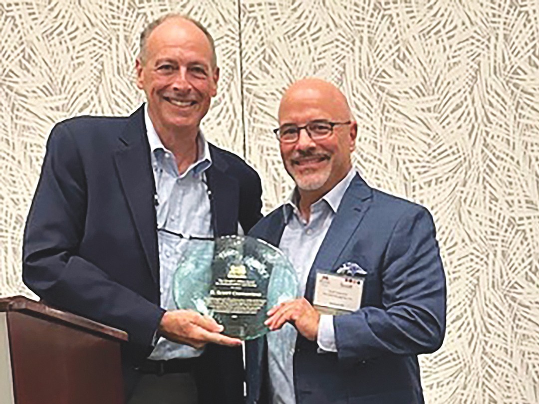 Scott Costantino, right, accepts the Joseph P. Milton Professionalism and Civility Award.