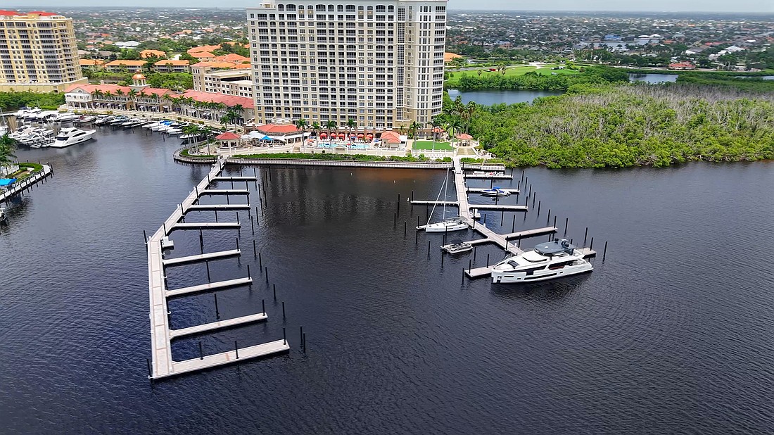 The new dock system at Tarpon Point Marina in Cape Coral features Golden Marine's 950 Series Double Track Aluminum Dock System.