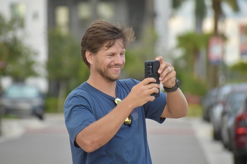 Bradenton's Carter Sibley is a proud dad. Here, he's taking a video of 4-year-old Reagan as she plays the maracas on stage, but he was also waving his arms over his head and dancing along with her from the crowd.